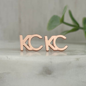 18K rose gold plated KC stud earrings This beautiful KC earrings will show your love for your hometown everywhere you go. The rose gold color is perfect for any outfit, day or night. Layer it with a KC necklace or wear it alone, either way you'll be sure to turn heads. 