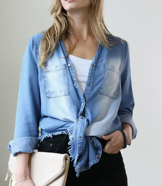 A must-have in any wardrobe, this chambray shirt top is perfect for layering or wearing on its own. The button-down style and frayed hem gives it a touch of edge, while the denim fabric keeps it casual and comfortable. Whether you're dressing it up or down, this shirt top is a versatile piece that you'll reach for again and again.