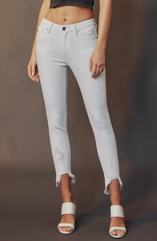 Add some edge to your denim collection with our newest KanCan style! A classic essential, these white jeans are both stylish and comfortable. With a high rise fit and distressed detailing, they are perfect for everyday wear. With a versatile and flattering fit, these jeans are a must-have for any fashion-savvy woman.