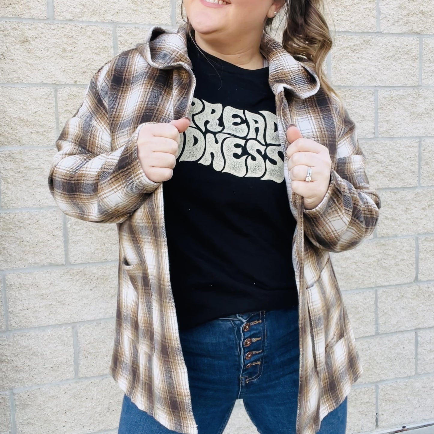 Looking for the perfect piece to keep you warm this season? Check out our Plaid Hooded Jacket! This cozy jacket is perfect for layering and will keep you comfortable all day long. The hood is great for chilly days or when you just want to add a little extra warmth. The brown plaid print is perfect for fall and the jacket is sure to become your new go-to piece.  Details Brown Plaid Lightweight Hooded Front Pockets Great for layering