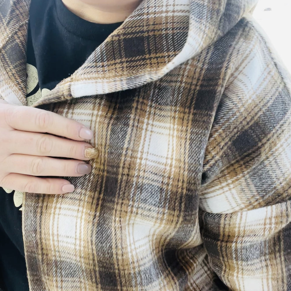 
                  
                    Looking for the perfect piece to keep you warm this season? Check out our Plaid Hooded Jacket! This cozy jacket is perfect for layering and will keep you comfortable all day long. The hood is great for chilly days or when you just want to add a little extra warmth. The brown plaid print is perfect for fall and the jacket is sure to become your new go-to piece.  Details Brown Plaid Lightweight Hooded Front Pockets Great for layering
                  
                