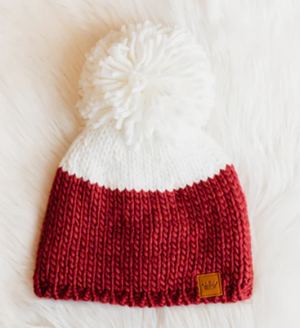 Color block knit hat with large pom accent