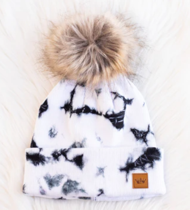 White & black tie dye knit hat with pom Fleece Lined Each hat is hand-dyed for character, no two pieces are the same 100% Cotton