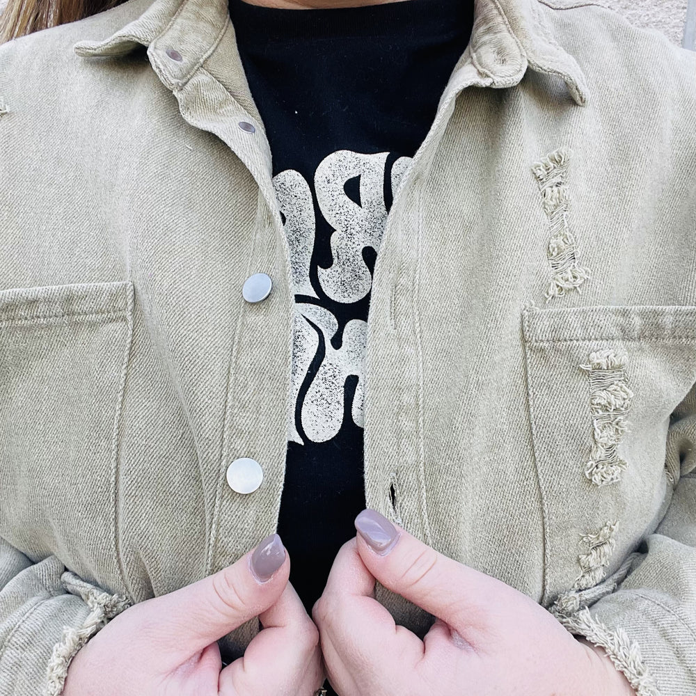 
                  
                    A touch of style to take your outfit up a notch. A must-have jacket to have in your closet this season. With a touch of distressed style, this jacket adds personality to any outfit. Throw it on over a simple dress or your favorite jeans for a chic and laid-back look. With its comfortable and easy fit, this jacket will quickly become your go-to for any occasion.  Details Washed Finish Distressed Button up jacket Layering piece Khaki color Loose Fit
                  
                