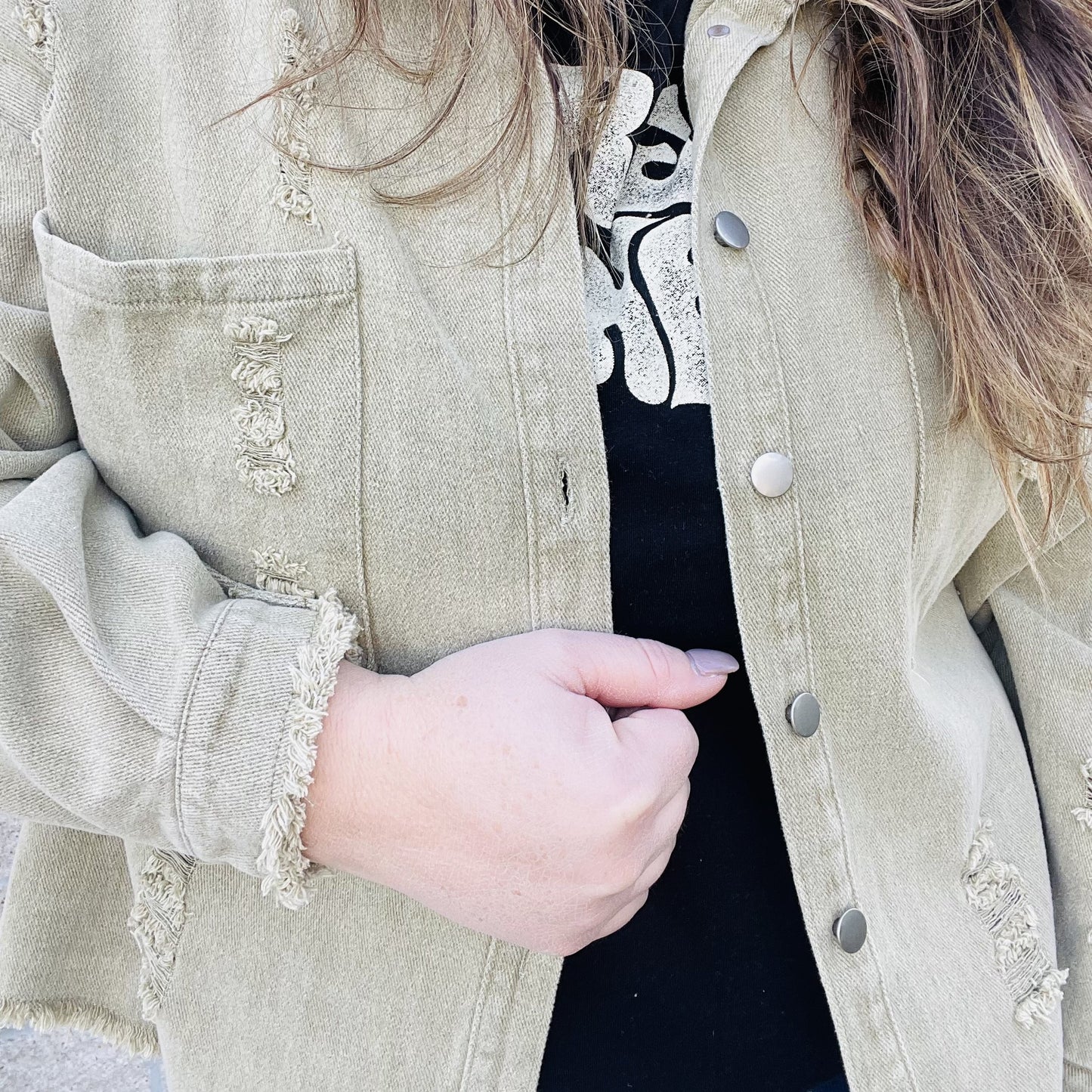 A touch of style to take your outfit up a notch. A must-have jacket to have in your closet this season. With a touch of distressed style, this jacket adds personality to any outfit. Throw it on over a simple dress or your favorite jeans for a chic and laid-back look. With its comfortable and easy fit, this jacket will quickly become your go-to for any occasion.  Details Washed Finish Distressed Button up jacket Layering piece Khaki color Loose Fit